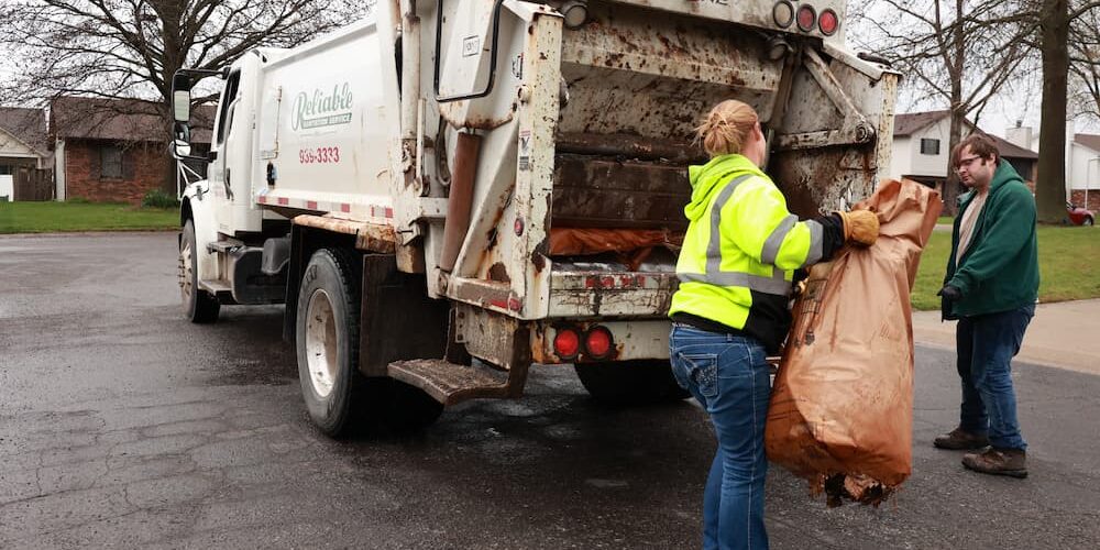Large bag thrown in back of dumpster